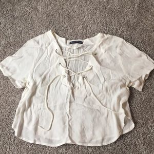 White cris cross front Brandy Melville crop shirt